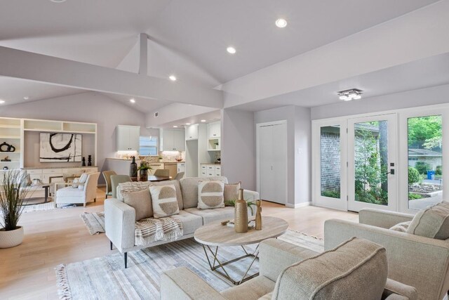 8702 Willowick Dr, Austin, TX 78759 - living area with vaulted ceiling, light wood finished floors, and recessed lighting