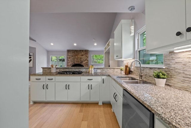 8702 Willowick Dr, Austin, TX 78759 - kitchen with dishwasher, white cabinets, backsplash, and recessed lighting