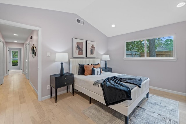 8702 Willowick Dr, Austin, TX 78759 - bedroom with vaulted ceiling, light wood-style flooring, and recessed lighting