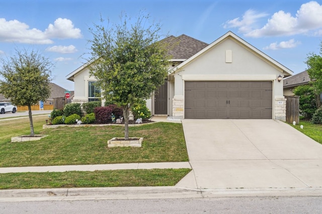 113 Tailwind Dr, Kyle, TX 78640 - ranch-style house with a garage, a front lawn, stone siding, stucco siding, and concrete driveway
