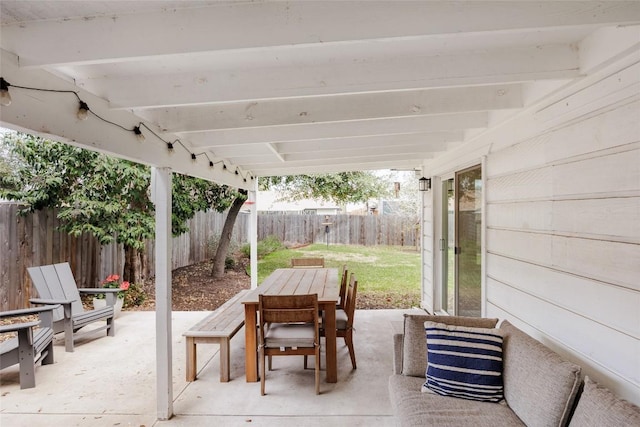 view of patio / terrace with a fenced backyard and outdoor dining space