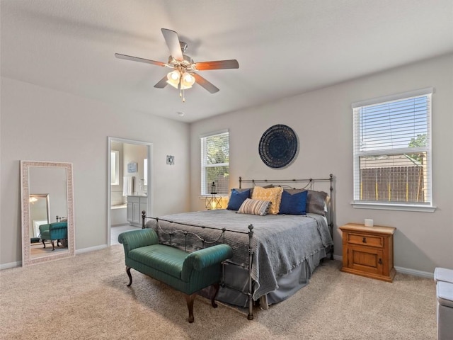 4104 Porter Farm Rd, Georgetown, TX 78628 - bedroom featuring light colored carpet, ensuite bath, and a ceiling fan