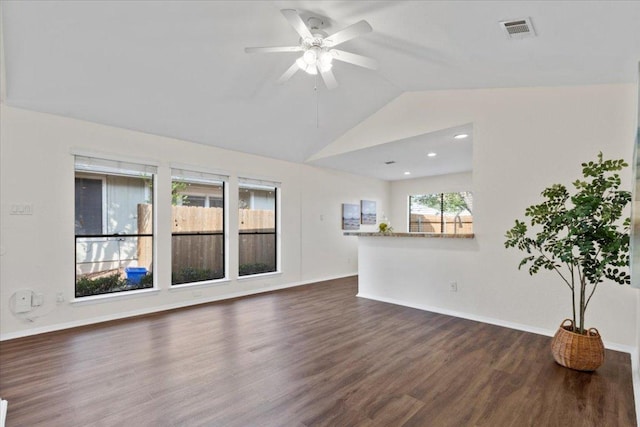 12301 Furrow Cv Unit B, Austin, TX 78753 - unfurnished living room with dark wood finished floors, vaulted ceiling, a ceiling fan, and recessed lighting