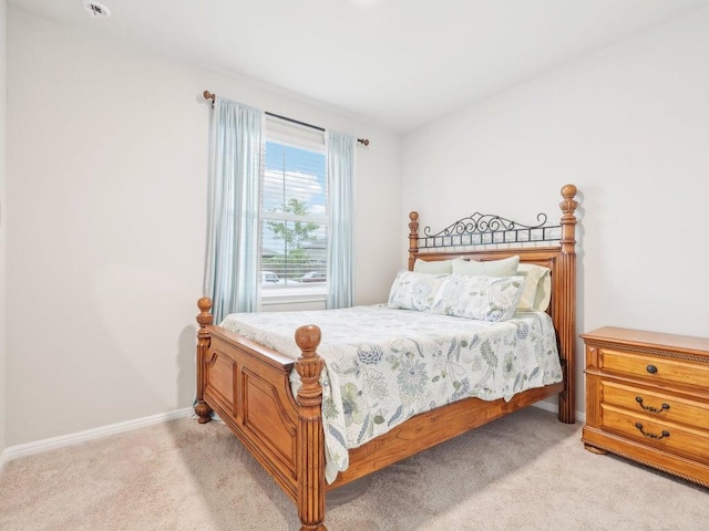 709 Bluffview Dr, Bastrop, TX 78602 - bedroom with light carpet and baseboards