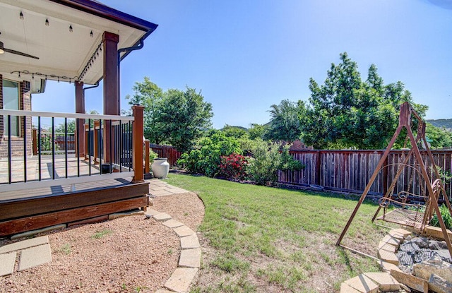 5617 Rio Chama Cv, Austin, TX 78738 - fenced backyard featuring a deck