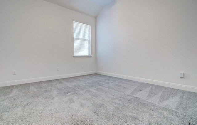 5617 Rio Chama Cv, Austin, TX 78738 - unfurnished room with carpet floors, baseboards, and vaulted ceiling