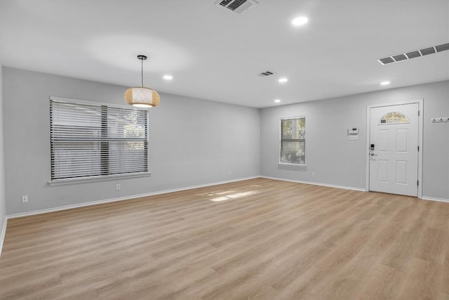 1434 Meadow Pkwy, San Marcos, TX 78666 - interior space featuring light wood-style flooring, visible vents, and recessed lighting