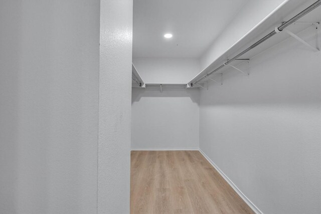 1434 Meadow Pkwy, San Marcos, TX 78666 - spacious closet featuring light wood-type flooring