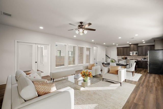 932 Azul Lagoon Dr Unit 18, Leander, TX 78641 - living area with wood finished floors, recessed lighting, and ceiling fan