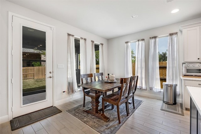 104 Trans Pecos Ct, Georgetown, TX 78628 - dining room featuring light wood-type flooring and recessed lighting