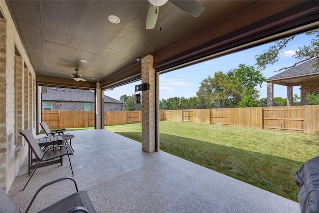 104 Trans Pecos Ct, Georgetown, TX 78628 - fenced backyard with a ceiling fan and a patio