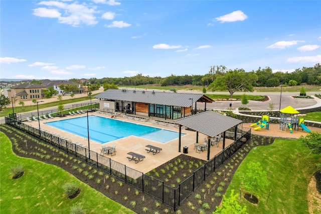 104 Trans Pecos Ct, Georgetown, TX 78628 - community pool featuring a patio and view of scattered trees