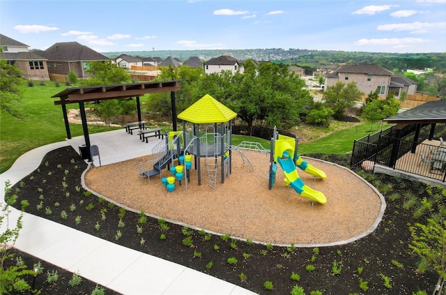 104 Trans Pecos Ct, Georgetown, TX 78628 - community playground featuring a residential view, a gazebo, and a lawn