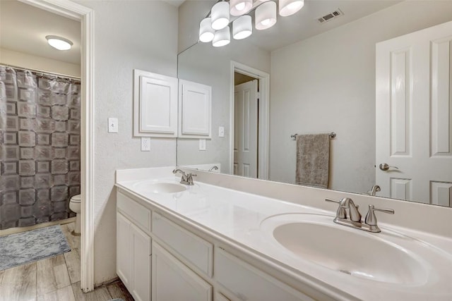 30003 Oakland Hills Dr, Georgetown, TX 78628 - bathroom featuring toilet and double vanity