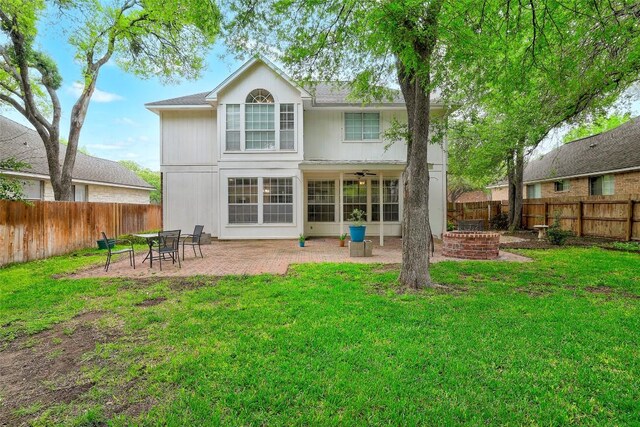 30003 Oakland Hills Dr, Georgetown, TX 78628 - back of house featuring an outdoor fire pit, a fenced backyard, a patio, and a ceiling fan