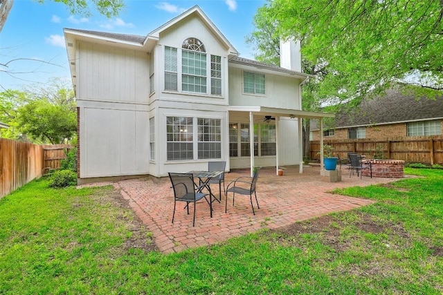 30003 Oakland Hills Dr, Georgetown, TX 78628 - rear view of house featuring a fire pit, a chimney, a fenced backyard, and a patio