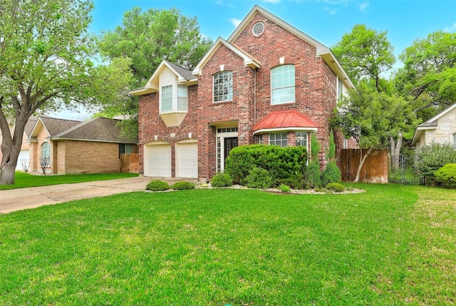 30003 Oakland Hills Dr, Georgetown, TX 78628 - traditional-style home featuring brick siding, a garage, and driveway