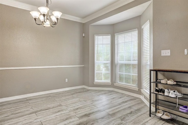 30003 Oakland Hills Dr, Georgetown, TX 78628 - unfurnished dining area featuring a chandelier, wood finished floors, crown molding, and plenty of natural light