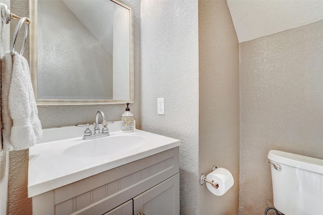 30003 Oakland Hills Dr, Georgetown, TX 78628 - half bathroom with vanity and a textured wall