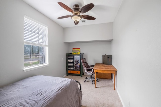 bedroom with baseboards, multiple windows, visible vents, and carpet