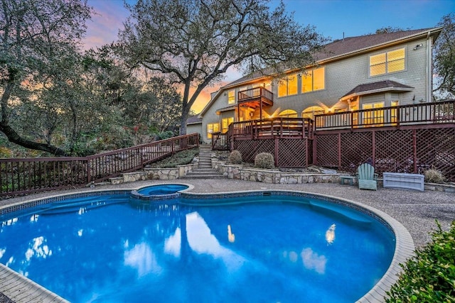 8001 Bell Mountain Dr, Austin, TX 78730 - view of swimming pool with stairway, a deck, and a pool with connected hot tub