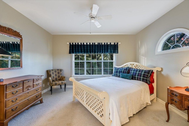 8001 Bell Mountain Dr, Austin, TX 78730 - carpeted bedroom featuring multiple windows and a ceiling fan