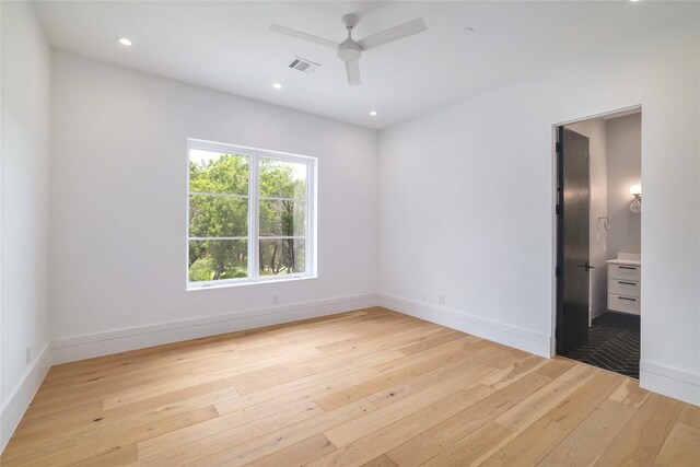 2701 Toro Canyon Rd Unit B, Austin, TX 78746 - unfurnished room with light wood finished floors, a ceiling fan, and recessed lighting