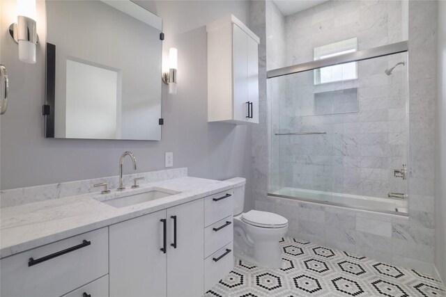 2701 Toro Canyon Rd Unit B, Austin, TX 78746 - full bath featuring vanity, tiled shower / bath, and tile patterned flooring