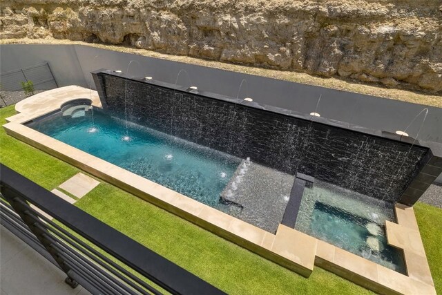 2701 Toro Canyon Rd Unit B, Austin, TX 78746 - view of swimming pool with a hot tub