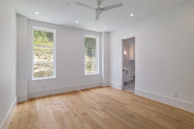 2701 Toro Canyon Rd Unit B, Austin, TX 78746 - unfurnished room featuring light wood finished floors, a ceiling fan, and recessed lighting