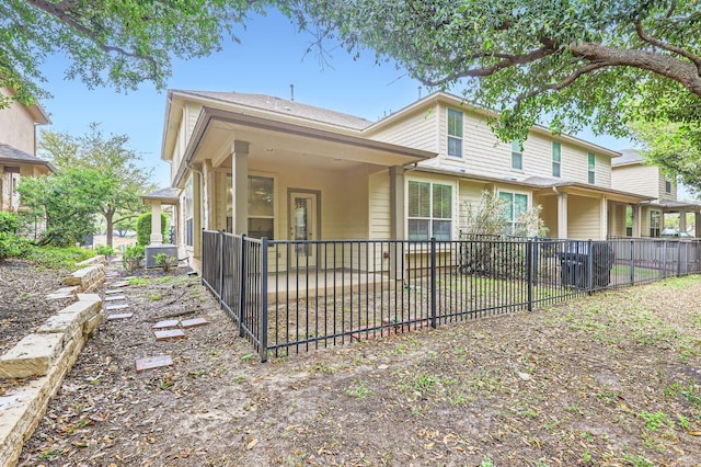 back of house featuring fence and a patio