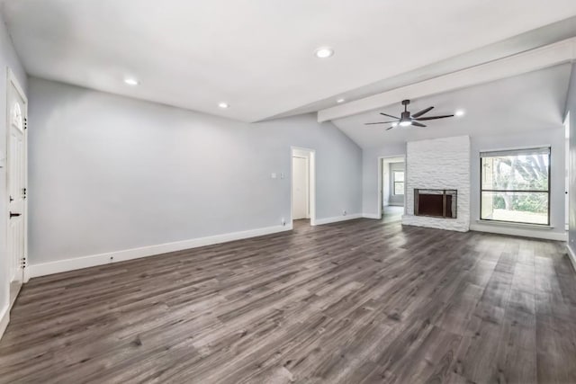2009 Scofield Ln, Austin, TX 78727 - unfurnished living room featuring ceiling fan, dark wood-style floors, baseboards, a stone fireplace, and recessed lighting