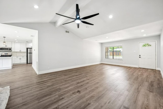 unfurnished living room featuring vaulted ceiling with beams, wood finished floors, recessed lighting, and ceiling fan