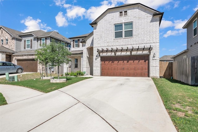 view of front facade featuring a garage, fence, concrete driveway, a front yard, and brick siding