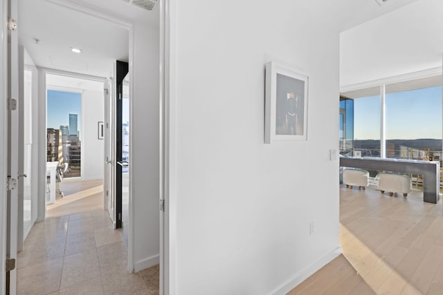 313 W 17th St Unit 1605, Austin, TX 78701 - hall with expansive windows and baseboards