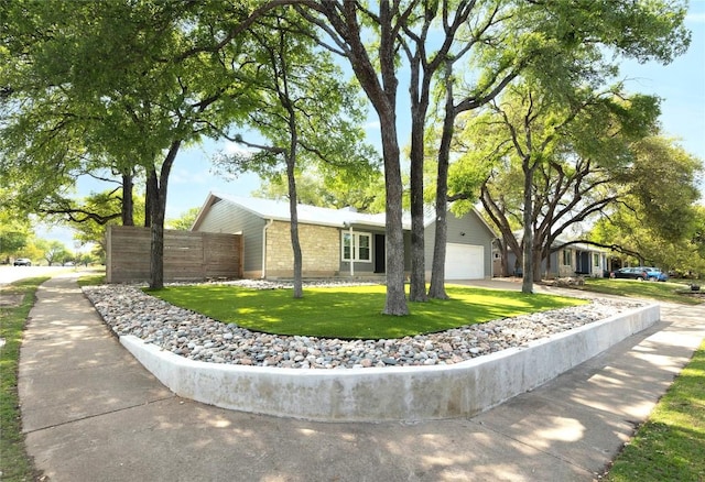 12300 Cassady Dr, Austin, TX 78727 - view of front facade with concrete driveway