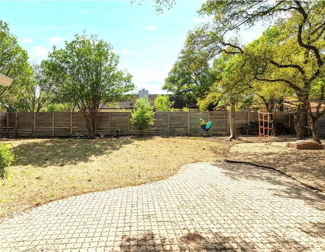 12300 Cassady Dr, Austin, TX 78727 - fenced backyard featuring a patio
