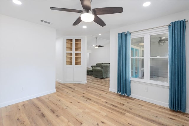 12300 Cassady Dr, Austin, TX 78727 - spare room featuring ceiling fan, wood finished floors, and recessed lighting