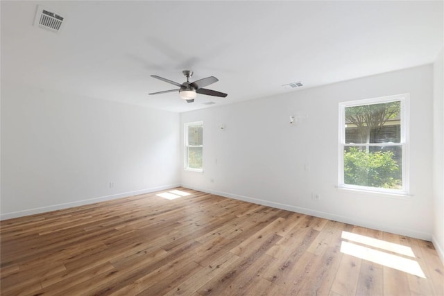 12300 Cassady Dr, Austin, TX 78727 - empty room with light wood-style floors and a ceiling fan
