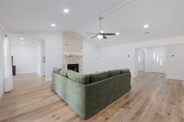 12300 Cassady Dr, Austin, TX 78727 - living area with ceiling fan, light wood-style floors, a fireplace, and recessed lighting