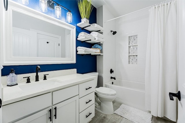 96 Island Dr Unit 44, Horseshoe Bay, TX 78657 - full bathroom featuring vanity, shower / bath combo, and wood finished floors