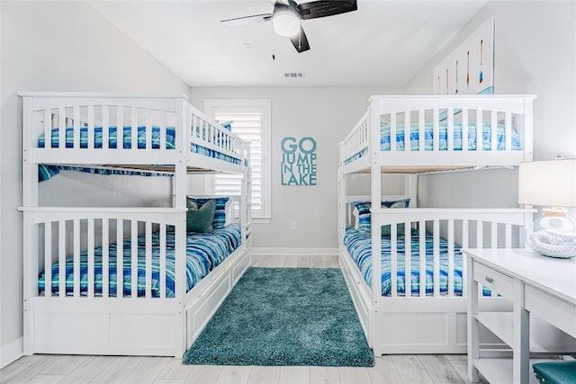 96 Island Dr Unit 44, Horseshoe Bay, TX 78657 - bedroom with wood finished floors