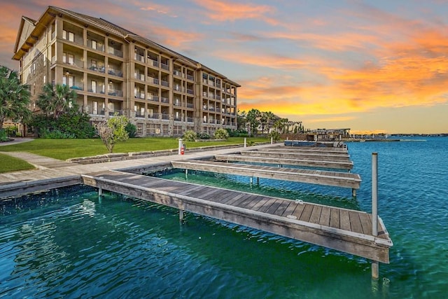 96 Island Dr Unit 44, Horseshoe Bay, TX 78657 - dock area with a water view and a yard
