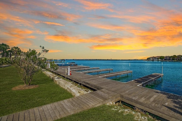96 Island Dr Unit 44, Horseshoe Bay, TX 78657 - dock featuring a water view and a lawn