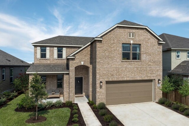 7805 Tranquil Glade Trl, Austin, TX 78744 - traditional home featuring fence, an attached garage, concrete driveway, brick siding, and roof with shingles