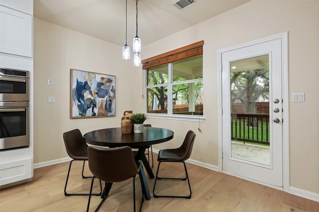 3615 Turkey Path Bnd, Cedar Park, TX 78613 - dining space featuring light wood-style floors and healthy amount of natural light