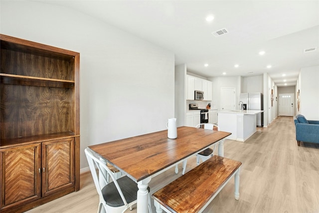806 Vineyard Falls Rd, Austin, TX 78748 - dining room featuring light wood-style flooring, baseboards, and recessed lighting
