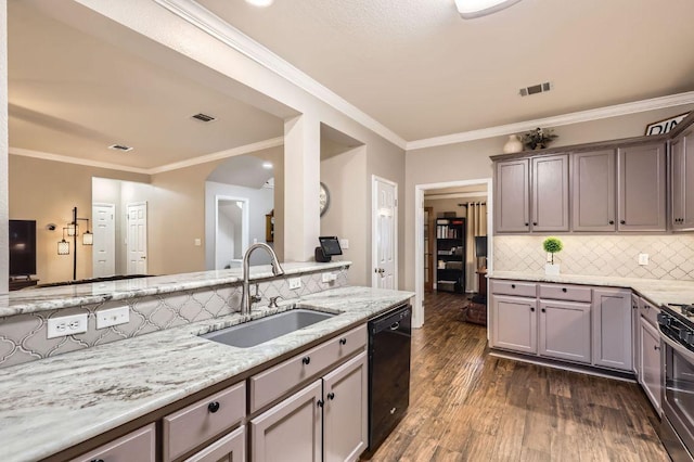706 Belmont Dr, Georgetown, TX 78626 - kitchen with a sink, light stone countertops, dishwasher, dark wood-style floors, and visible vents