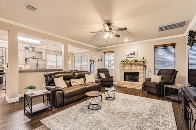 706 Belmont Dr, Georgetown, TX 78626 - living area featuring dark wood-style floors, visible vents, and a ceiling fan