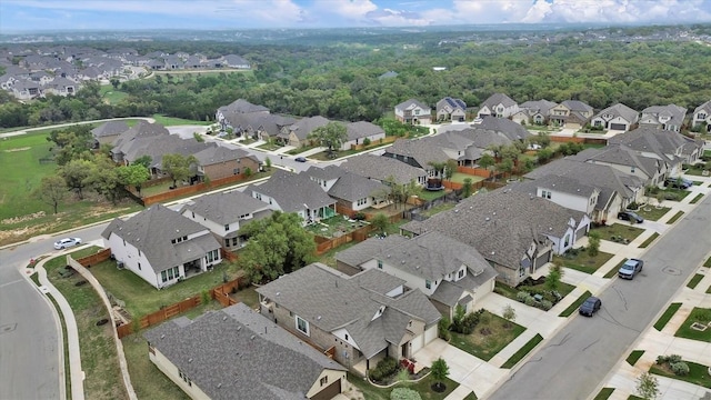 aerial view of property's location with nearby suburban area